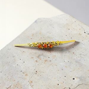 Vintage Gold Tone Bar Pin with Amber  Rhinestones marked Austria!